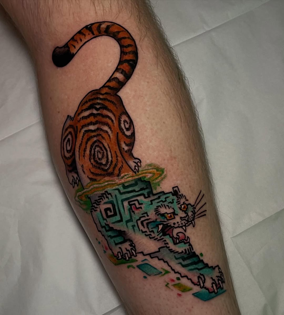 Vivid color tattoo by John Tucker