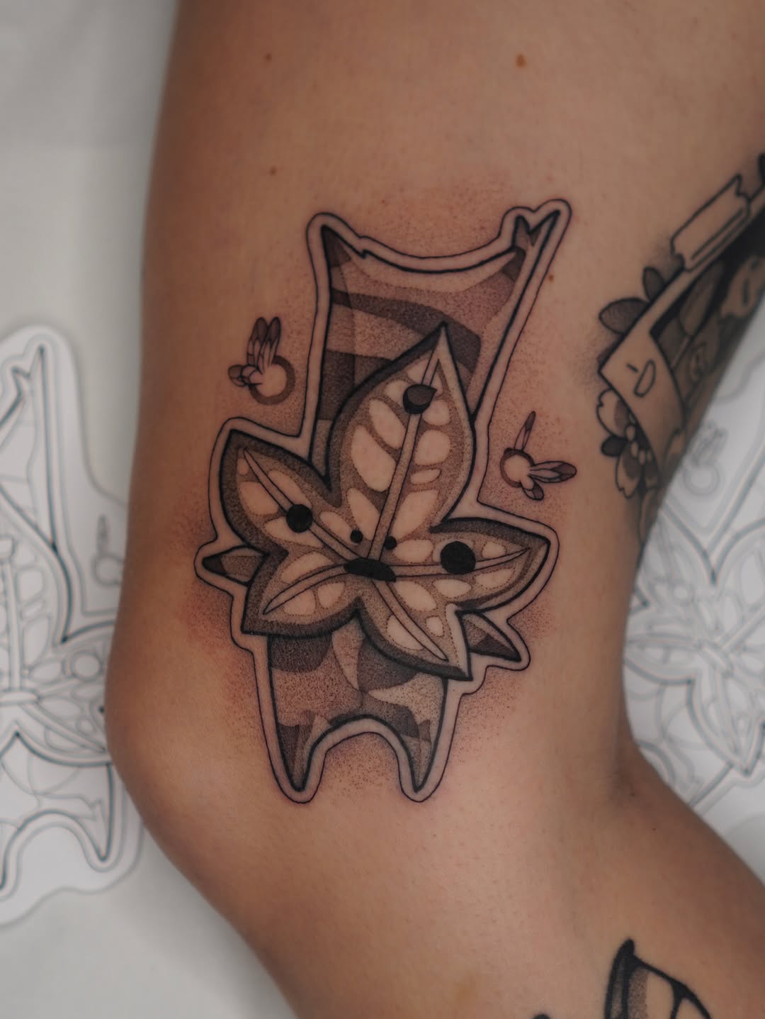 Kodi Ellis black grey anime tattoo