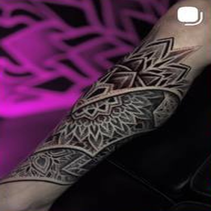 Mandala dotwork tattoo