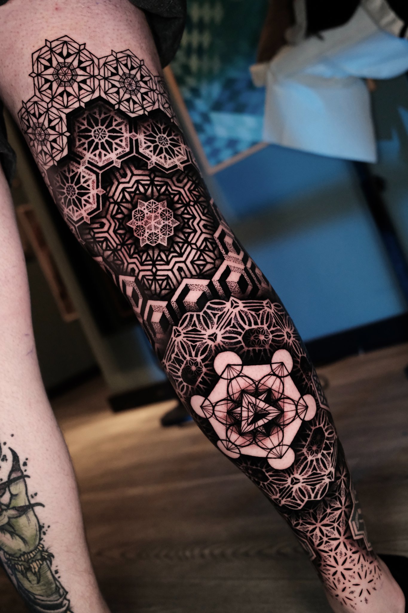 Geometric tattoo by Raul Wesche