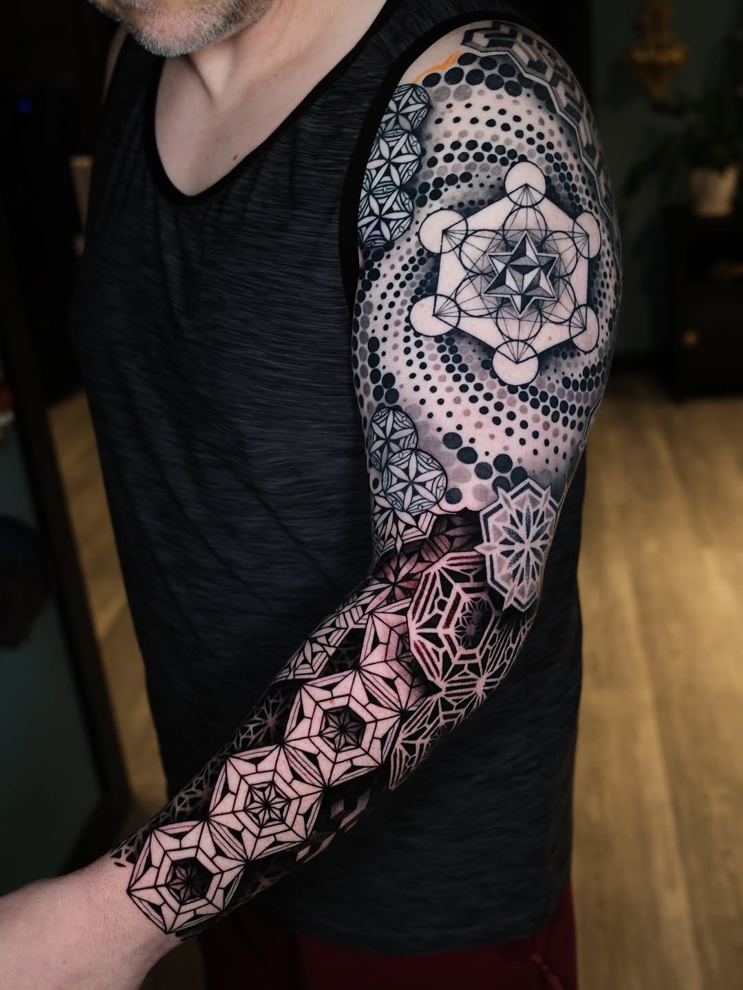 Geometric tattoo by Raul Wesche