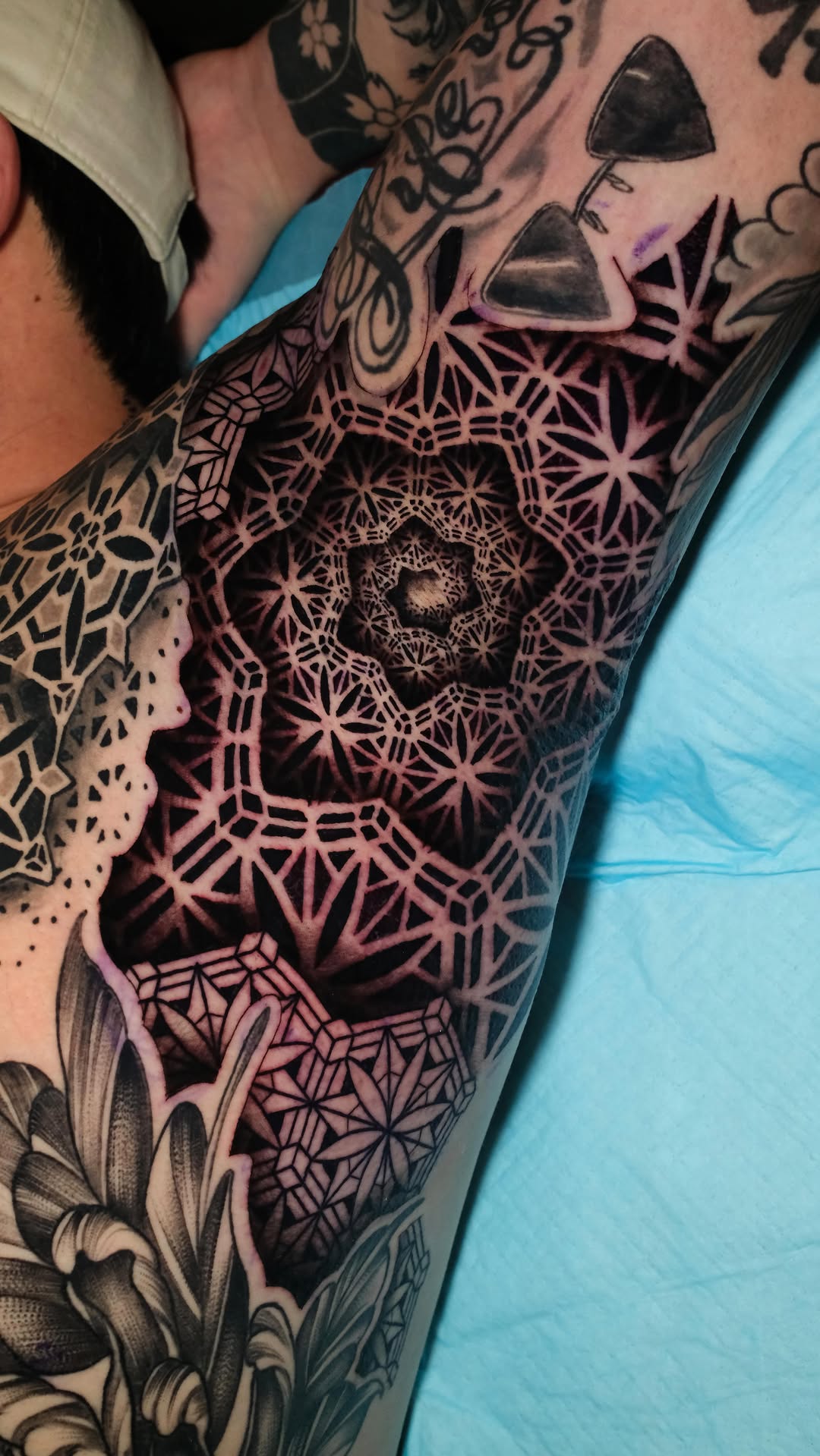 Geometric tattoo by Raul Wesche